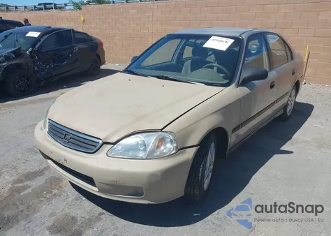 2000 Honda Civic Dx z USA, uszkodzony, nr VIN 1HGEJ6624YL048773